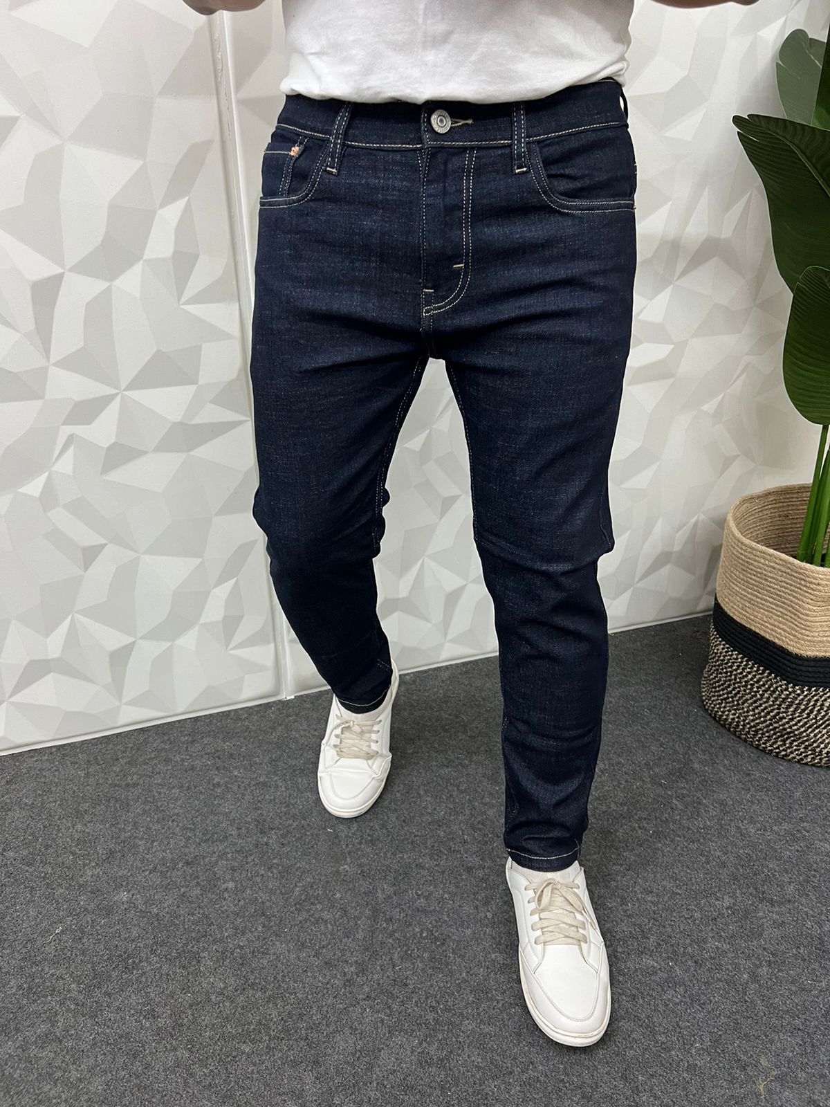 Ankle length raw wash jeans