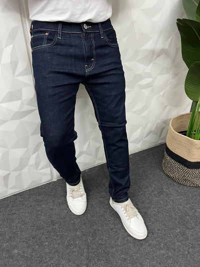 Ankle length raw wash jeans